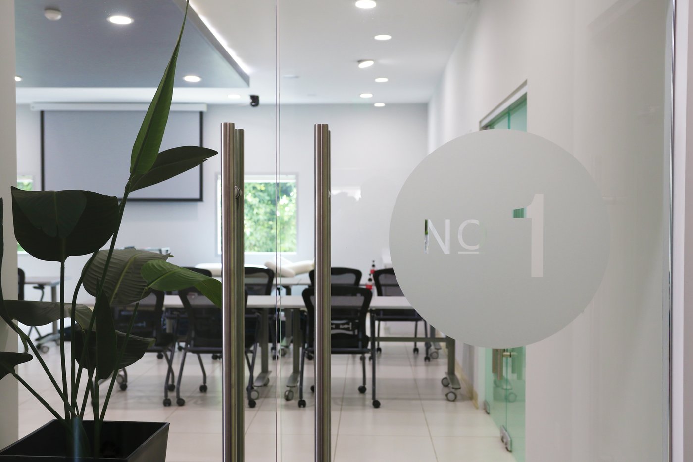 Glass entry doors to the main classroom labeled No 1